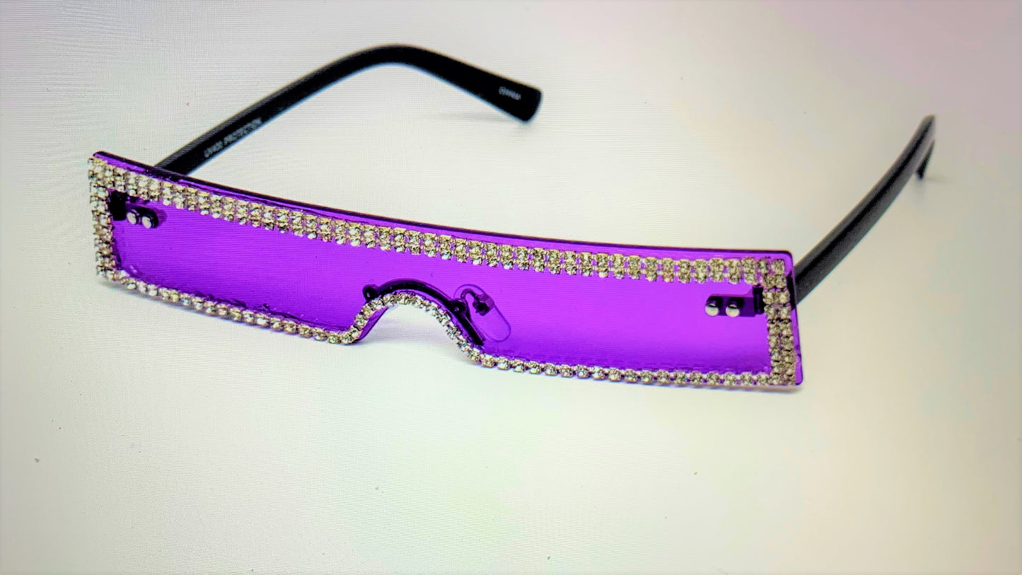 Wait a minute, don't forget the high fashion rhinestone slim color sunglasses. The sunglasses has a thin high fashion cyber retro rectangular design with rhinestones infused borders and flexible acrylic frames. They're screaming, SOPHISTICATED LADY!