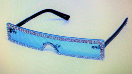 Wait a minute, don't forget the high fashion rhinestone slim color sunglasses. The sunglasses has a thin high fashion cyber retro rectangular design with rhinestones infused borders and flexible acrylic frames. They're screaming, SOPHISTICATED LADY!