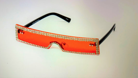Wait a minute, don't forget the high fashion rhinestone slim color sunglasses. The sunglasses has a thin high fashion cyber retro rectangular design with rhinestones infused borders and flexible acrylic frames. They're screaming, SOPHISTICATED LADY!