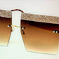 The high fashion oversized rimless square design with beautifully gradient lens and laced rhinestone eyebrows.  Queens, you'll be looking as fine as wine, REAL TASTEE!